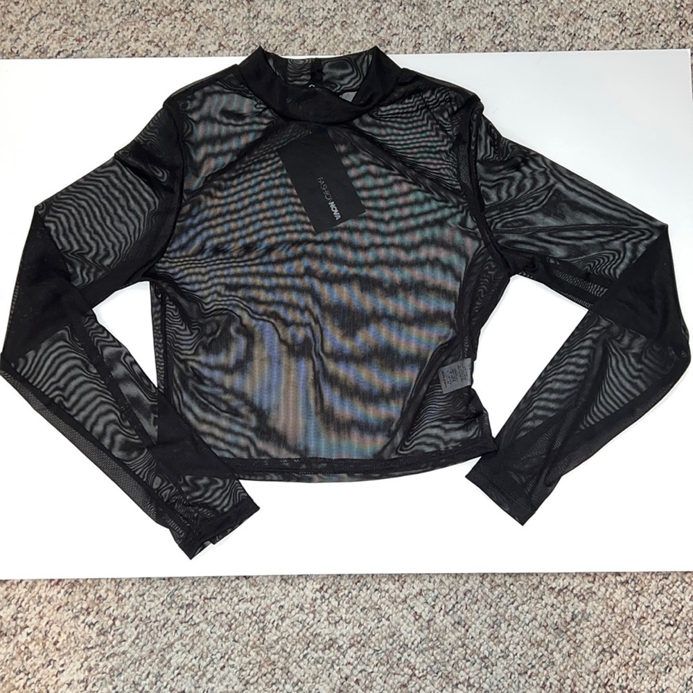 Completely see through top.